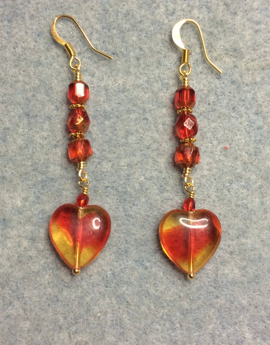 Red and yellow Czech glass heart bead earrings adorned with bright red Czech glass beads.