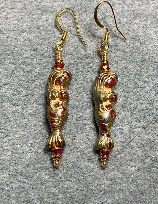 Dark red (with gold inlay) Czech glass mermaid bead earrings adorned with dark red Chinese crystal beads.