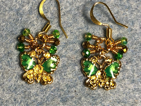 Small vintage green and gold enamel butterfly charm earrings adorned with tiny dangling green and gold Chinese crystal beads.