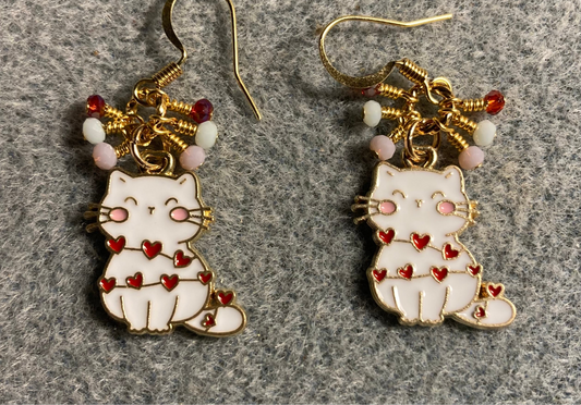 White, pink, and red enamel cat charm earrings adorned with tiny dangling white, pink, and red Chinese crystal beads.