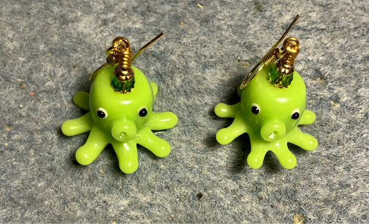 Lime green lamp work octopus bead earrings adorned with lime green Chinese crystal beads.