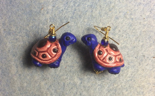 Large dark blue and rose ceramic turtle bead earrings adorned with dark blue Czech glass beads.