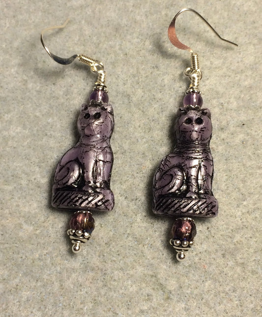 Opaque purple (with black inlay) fancy Czech glass fancy cat bead earrings adorned with purple Czech glass beads.