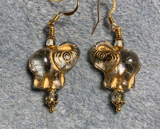 Clear (with gold inlay) Czech glass elephant bead earrings adorned with clear Czech glass beads.