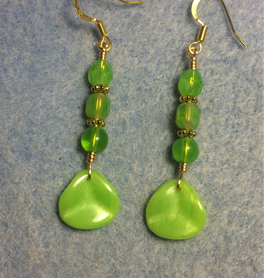 Opaque lime green Czech glass rose petal earrings adorned with lime green Czech glass beads.