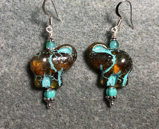 Amber (with turquoise inlay) Czech glass elephant bead earrings adorned with turquoise Czech glass beads.