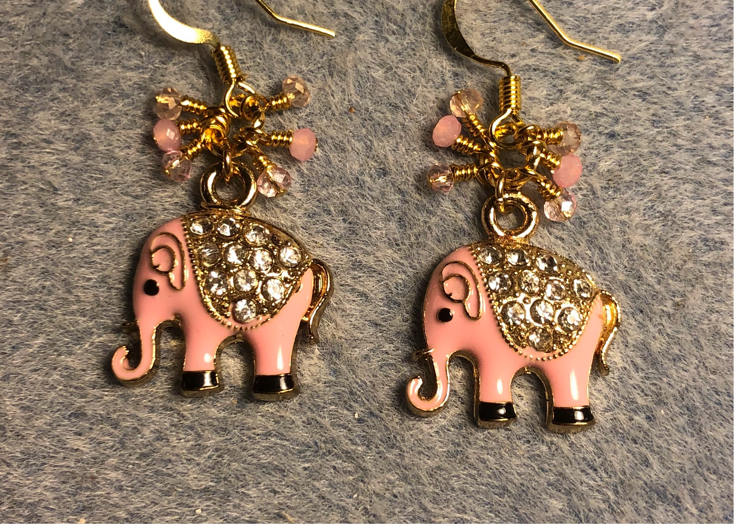 Pink enamel and colorful rhinestone elephant charm earrings adorned with tiny dangling pink and gold Chinese crystal beads.