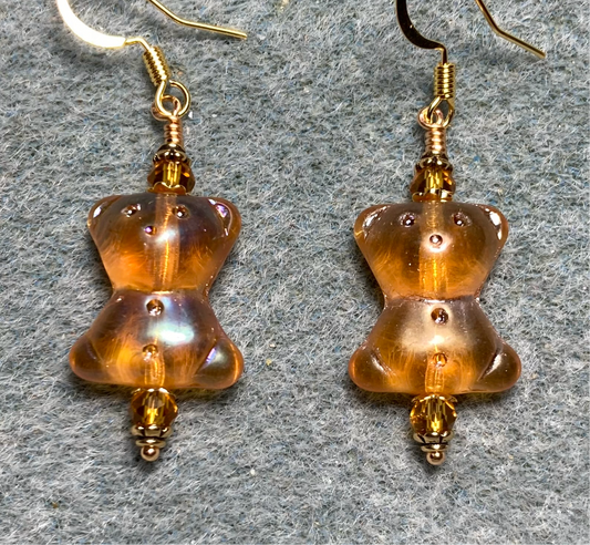 Translucent amber Czech glass teddy bear bead earrings adorned with amber Chinese crystal beads.