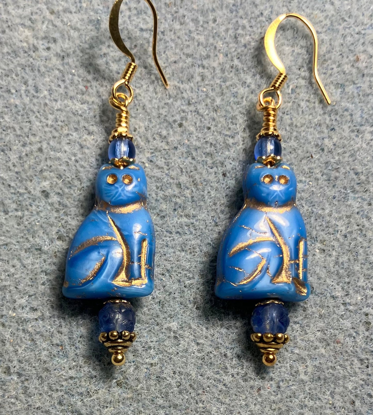 Capri blue (with gold inlay) Czech glass cat bead earrings adorned with capri blue Czech glass beads.