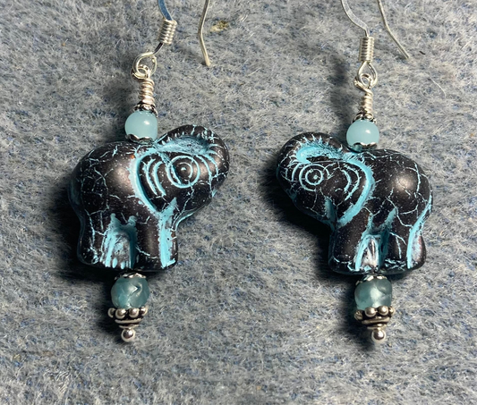 Black (with light blue inlay) Czech glass elephant bead earrings adorned with light blue Czech glass beads.