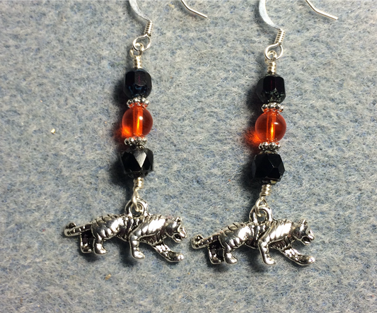 Silver tiger charm earrings adorned with black and gold Czech glass beads