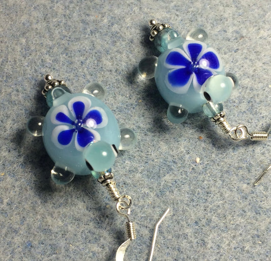 Light aqua and blue lamp work turtle bead earrings adorned with light aqua Czech glass beads.