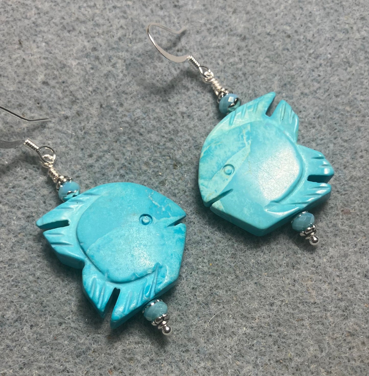 Large turquoise gemstone angelfish bead earrings adorned with turquoise Chinese crystal beads.