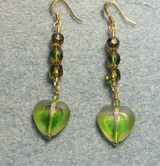 Yellow green Czech glass heart bead earrings adorned with yellow green Czech glass beads.