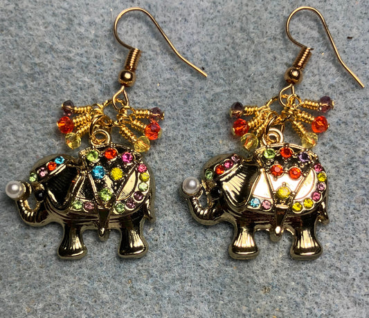 Large gold and multicolored rhinestone elephant charm earrings adorned with tiny dangling yellow, purple, and orange Chinese crystal beads.