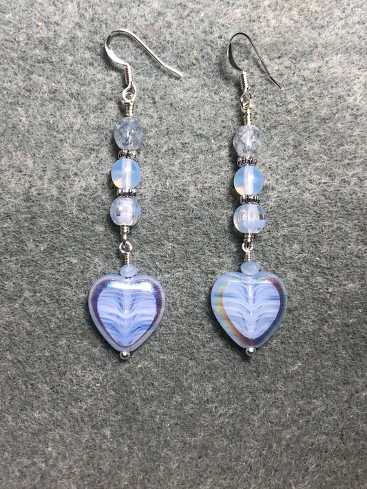 Light blue Czech glass heart bead earrings adorned with light blue Czech glass beads.
