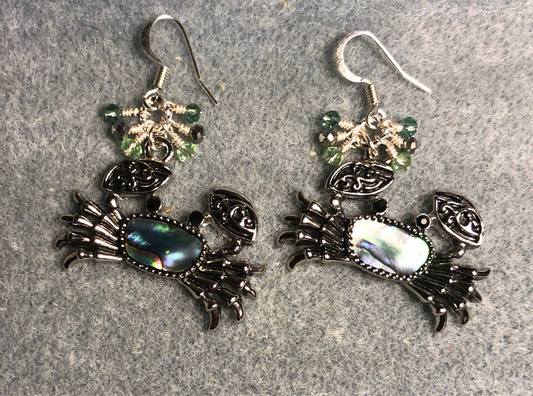 Silver and abalone crab charm earrings adorned with tiny dangling silver and green Chinese crystal beads.