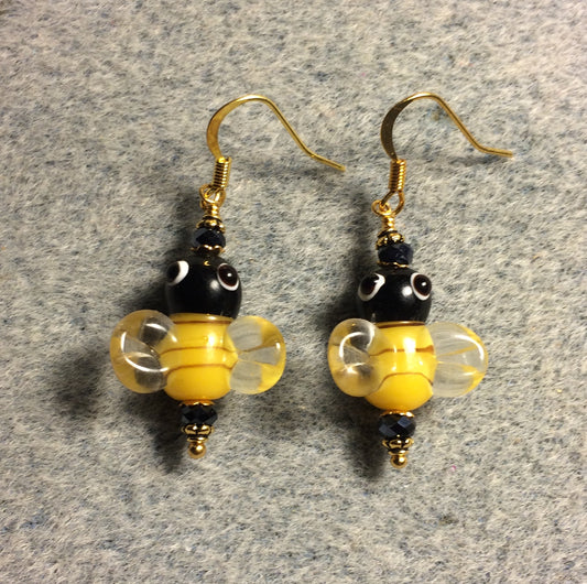 Black and yellow lamp work honeybee bead earrings adorned with black Chinese crystal beads.