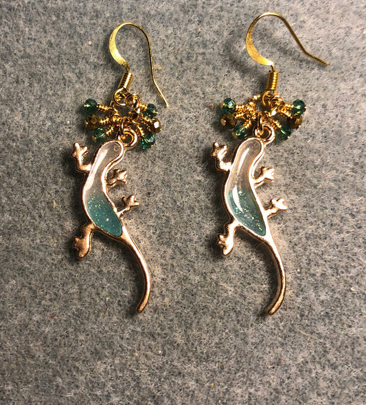 Teal and gold resin lizard charm earrings adorned with tiny dangling teal and gold Chinese crystal beads.