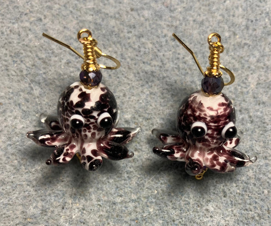 Dark purple and white mottled lamp work octopus bead earrings adorned with dark purple Chinese crystal beads.