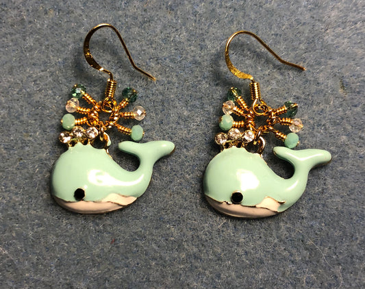 Aqua and white enamel and rhinestone whale charm earrings adorned with tiny dangling aqua, clear, and teal Chinese crystal beads.