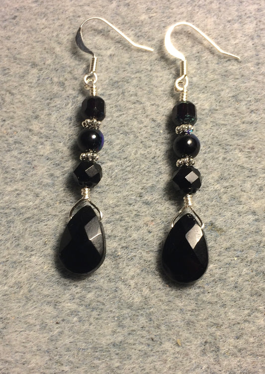 Black Czech glass briolette bead earrings adorned with black Czech glass beads.