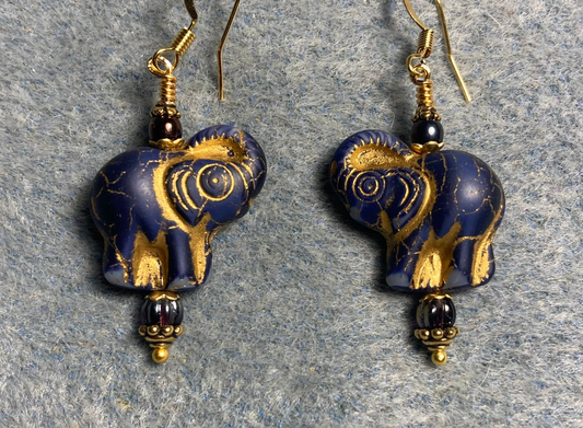 Purple (with gold inlay) Czech glass elephant bead earrings adorned with purple Czech glass beads.