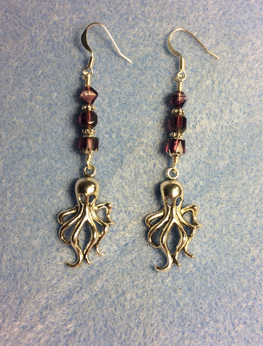 Silver octopus charm earrings adorned with purple Czech glass beads