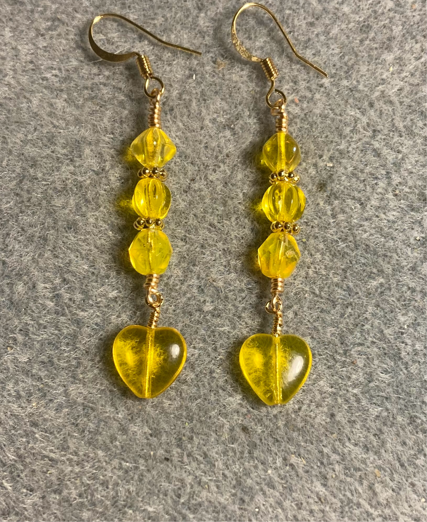 Small lemon yellow Czech glass heart bead earrings adorned with lemon yellow Czech glass beads.