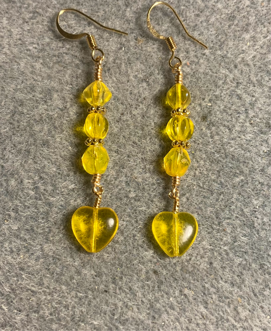Small lemon yellow Czech glass heart bead earrings adorned with lemon yellow Czech glass beads.