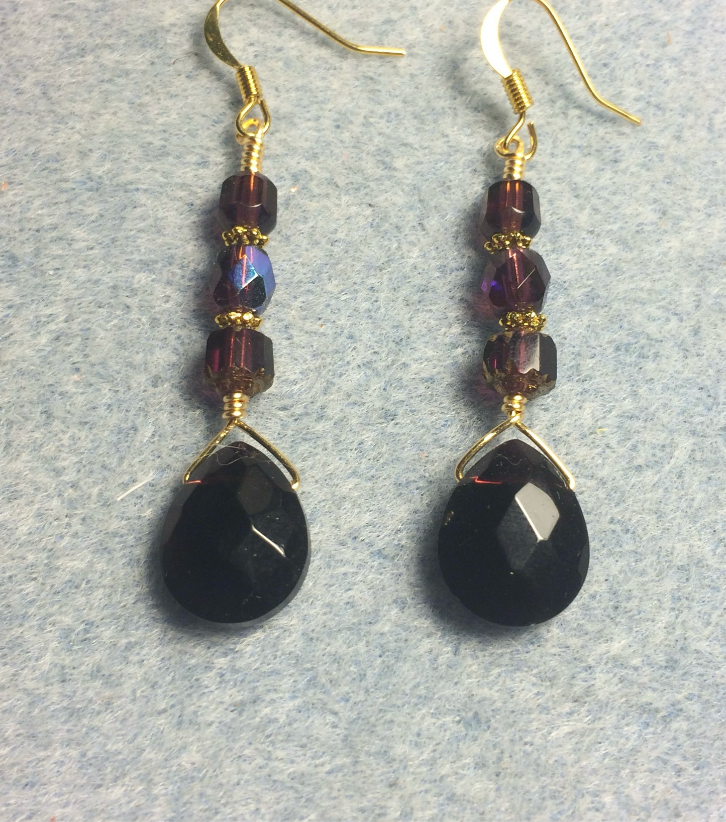 Dark purple Czech glass briolette bead earrings adorned with purple Czech glass beads.