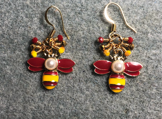 Dark red and golden yellow enamel and pearl striped honeybee charm earrings adorned with tiny dangling golden yellow, dark red, and gold Chinese crystal beads.