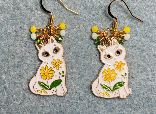 White, yellow, and green enamel cat charm earrings adorned with tiny dangling white, yellow, and green Chinese crystal beads.