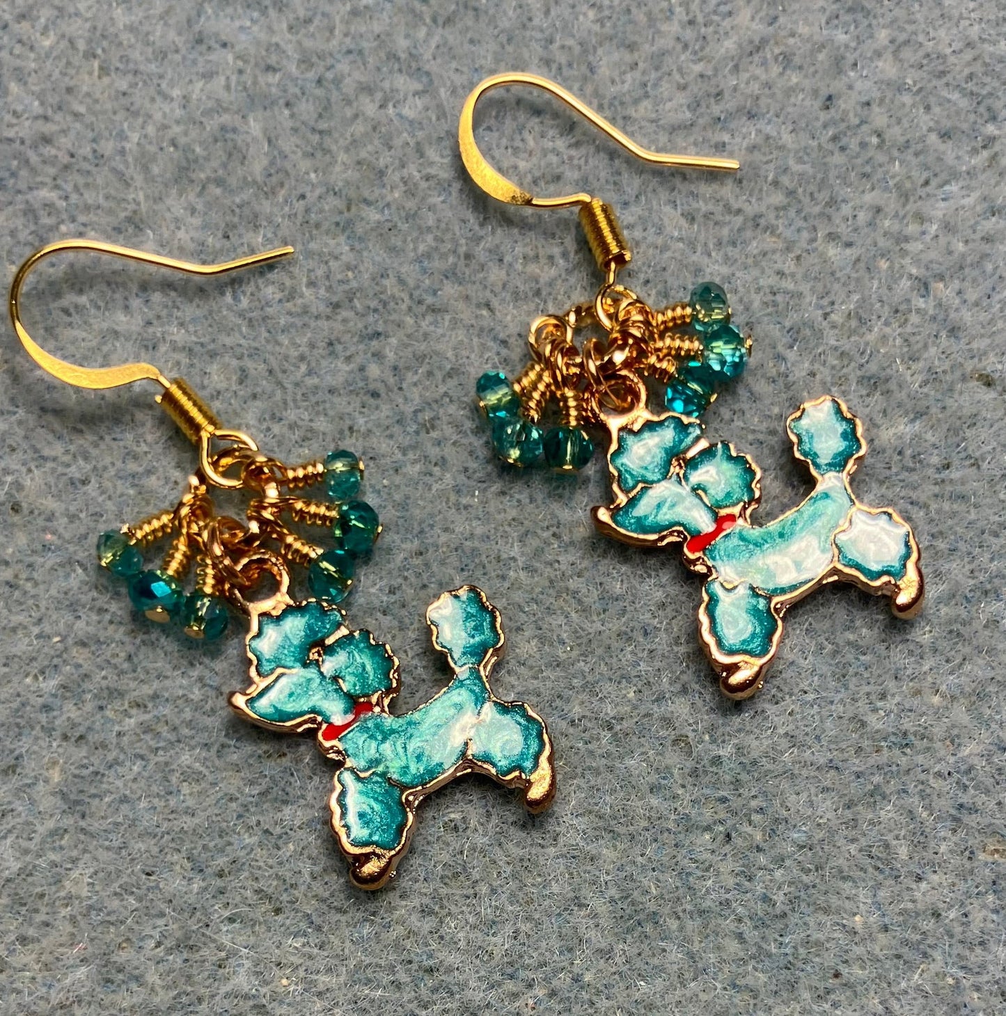 Turquoise and red enamel poodle charm earrings adorned with tiny dangling turquoise Chinese crystal beads.