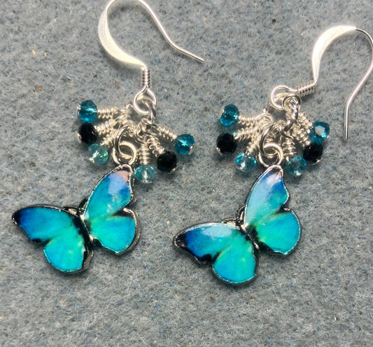 Turquoise and black enamel butterfly charm earrings adorned with tiny dangling turquoise and black Chinese crystal beads.