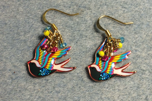 Turquoise, pink, and yellow enamel flying dove charm earrings adorned with tiny dangling turquoise, pink, and yellow Chinese crystal beads.