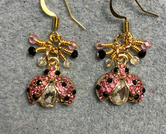 Pink, black, and clear enamel and rhinestone ladybug charm earrings adorned with tiny dangling pink, black, and clear Chinese crystal beads.