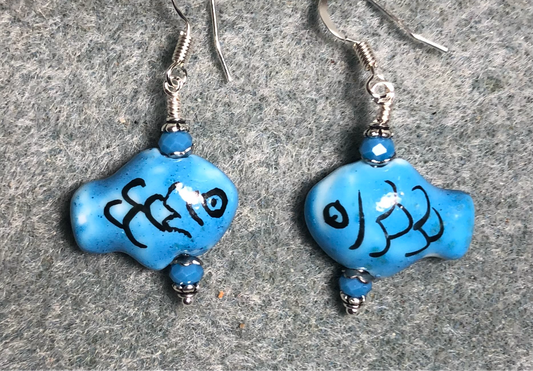 Blue and black ceramic fish bead earrings adorned with blue Chinese crystal beads.