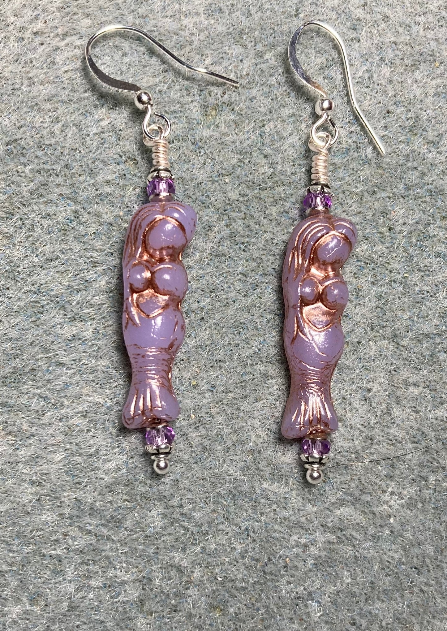 Light violet (with copper inlay) Czech glass mermaid bead earrings adorned with light violet Chinese crystal beads.