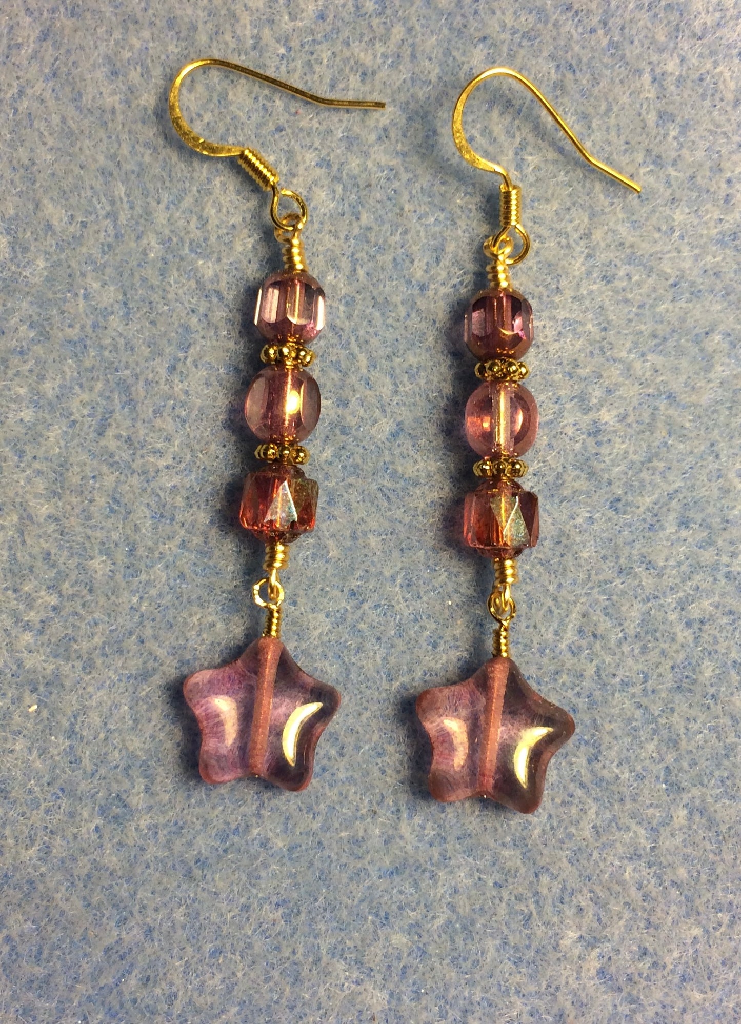 Small pinkish gold Czech glass star bead earrings adorned with pinkish gold Czech glass beads.