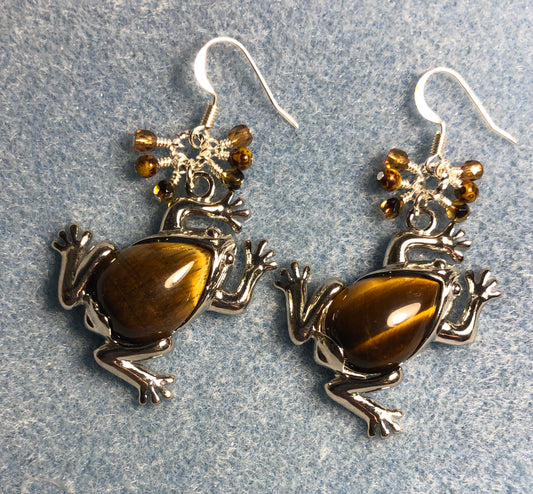 Large silver and brown tigereye gemstone frog charm earrings adorned with small dangling brown Czech glass beads.
