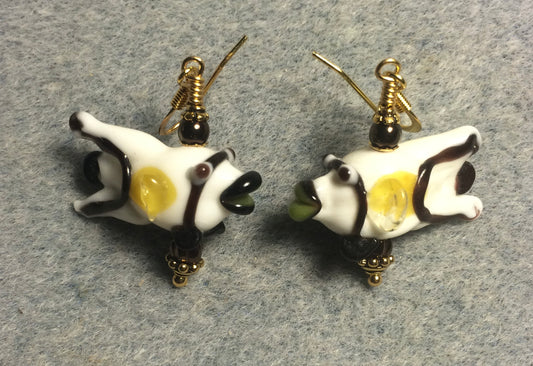 White, brown, and yellow lamp work kissing fish bead earrings adorned with brown Czech glass beads.
