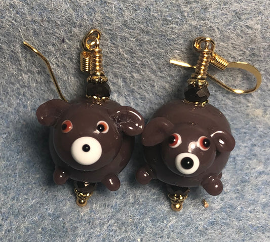 Brown lamp work sheep bead earrings adorned with brown Chinese crystal beads.