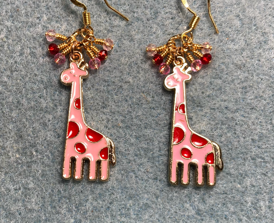 Pink and red enamel spotted giraffe charm earrings adorned with tiny dangling pink and red Chinese crystal beads.