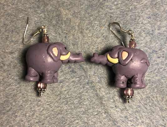 Purple ceramic elephant bead earrings adorned with purple Czech glass beads.