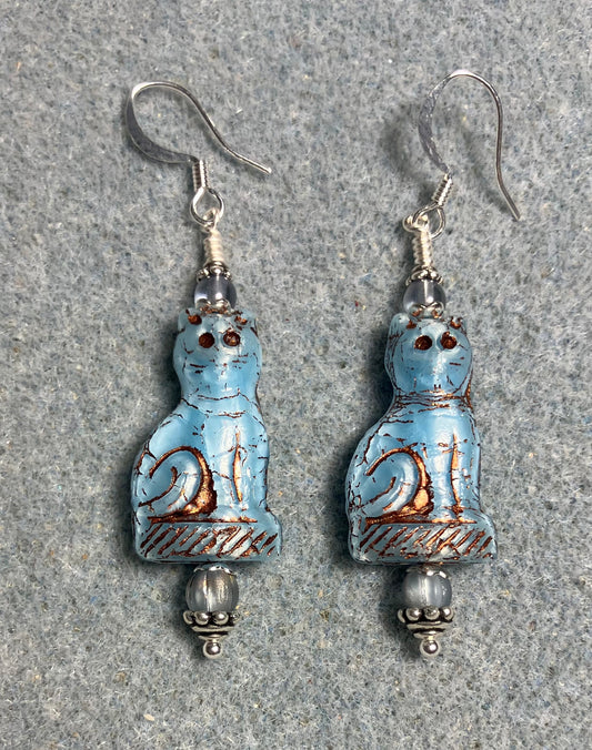 Opaque light blue (with copper inlay) fancy Czech glass cat bead earrings adorned with light blue Czech glass beads.
