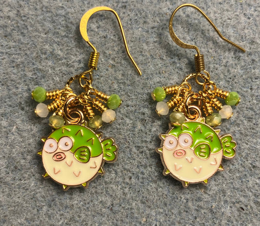 Small lime green enamel blowfish charm earrings adorned with tiny dangling lime green and white Chinese crystal beads.
