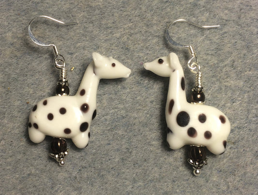 White and brown lamp work spotted giraffe bead earrings adorned with brown Czech glass beads.