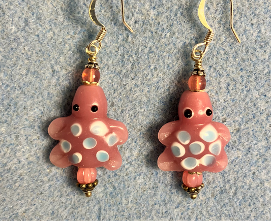 Pink with blue spots lamp work turtle bead earrings adorned with pink Czech glass beads.