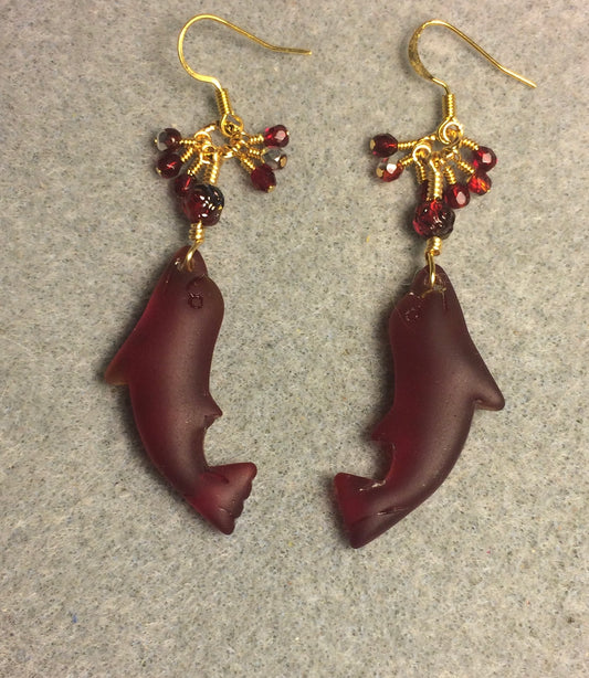 Dark red sea glass dolphin pendant bead earrings adorned with dark red Czech glass beads and tiny dangling dark red Czech glass beads.